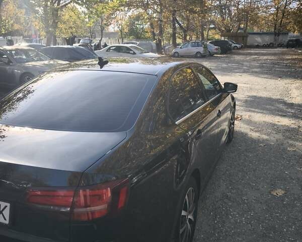 Черный Фольксваген Джетта, объемом двигателя 1.4 л и пробегом 89 тыс. км за 11400 $, фото 6 на Automoto.ua