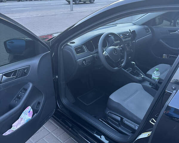 Черный Фольксваген Джетта, объемом двигателя 1.4 л и пробегом 105 тыс. км за 9500 $, фото 5 на Automoto.ua