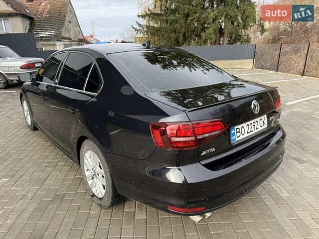 Черный Фольксваген Джетта, объемом двигателя 1.4 л и пробегом 151 тыс. км за 11000 $, фото 10 на Automoto.ua