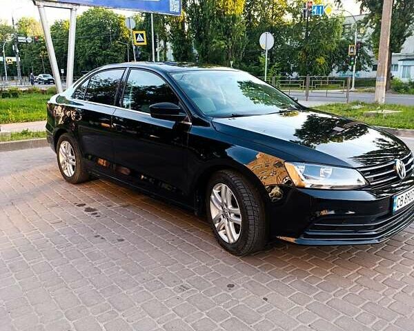Черный Фольксваген Джетта, объемом двигателя 1.4 л и пробегом 68 тыс. км за 12500 $, фото 2 на Automoto.ua