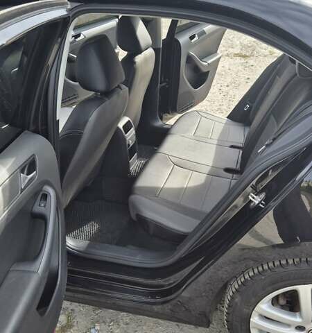 Чорний Фольксваген Джетта, об'ємом двигуна 1.4 л та пробігом 90 тис. км за 10700 $, фото 10 на Automoto.ua