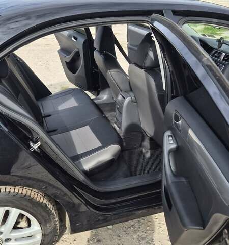 Чорний Фольксваген Джетта, об'ємом двигуна 1.4 л та пробігом 90 тис. км за 10700 $, фото 14 на Automoto.ua