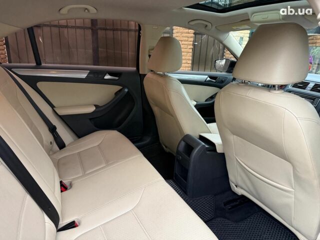 Черный Фольксваген Джетта, объемом двигателя 1.4 л и пробегом 160 тыс. км за 11990 $, фото 18 на Automoto.ua