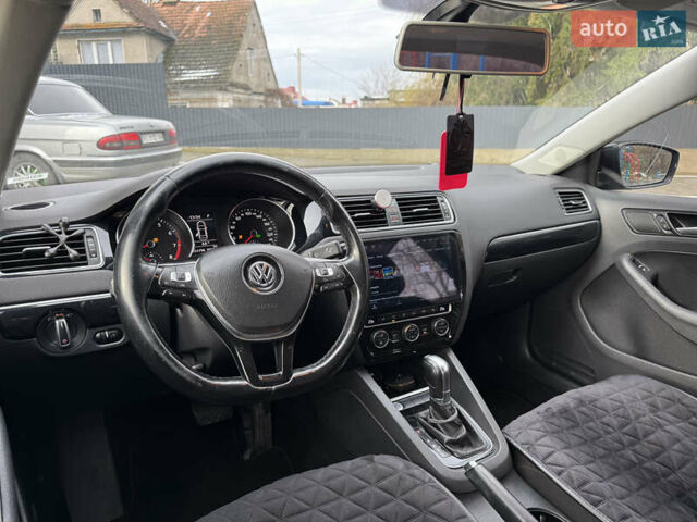 Черный Фольксваген Джетта, объемом двигателя 1.4 л и пробегом 151 тыс. км за 11000 $, фото 27 на Automoto.ua