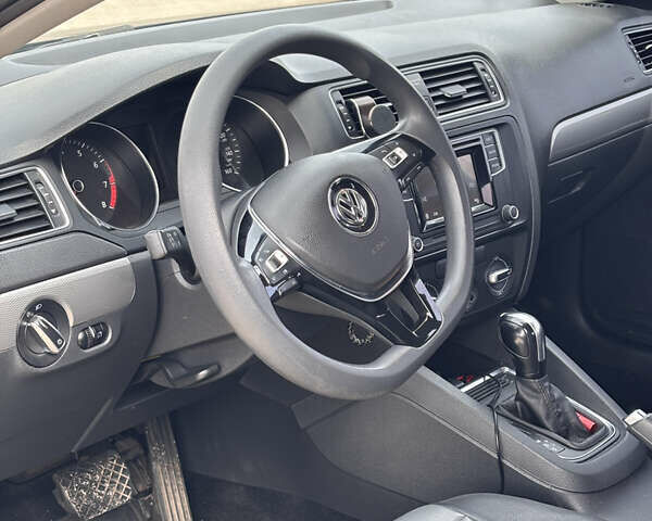 Черный Фольксваген Джетта, объемом двигателя 1.4 л и пробегом 66 тыс. км за 9900 $, фото 6 на Automoto.ua