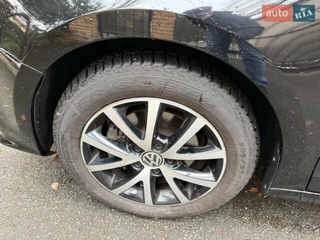 Черный Фольксваген Джетта, объемом двигателя 1.4 л и пробегом 160 тыс. км за 11990 $, фото 9 на Automoto.ua