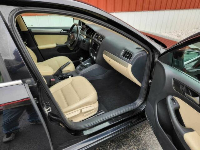 Черный Фольксваген Джетта, объемом двигателя 1.4 л и пробегом 62 тыс. км за 8900 $, фото 8 на Automoto.ua