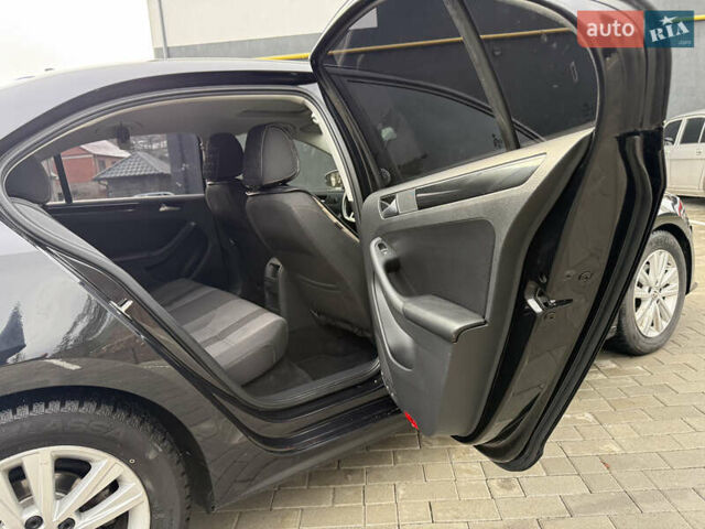 Черный Фольксваген Джетта, объемом двигателя 1.4 л и пробегом 151 тыс. км за 11000 $, фото 31 на Automoto.ua