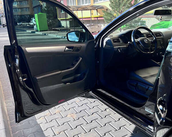 Черный Фольксваген Джетта, объемом двигателя 1.4 л и пробегом 156 тыс. км за 10500 $, фото 13 на Automoto.ua