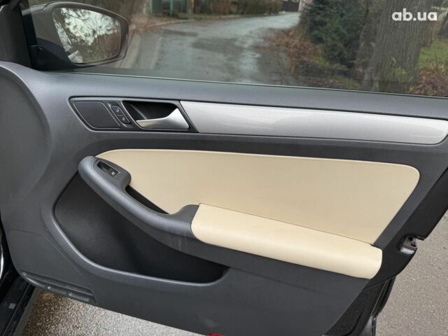 Черный Фольксваген Джетта, объемом двигателя 1.4 л и пробегом 160 тыс. км за 11990 $, фото 19 на Automoto.ua