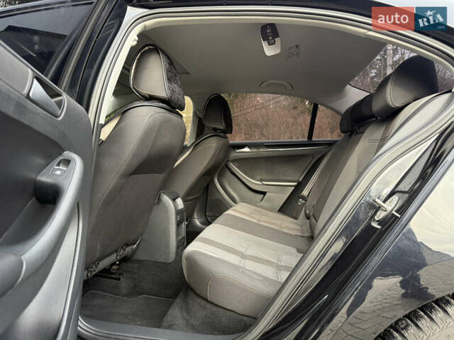 Черный Фольксваген Джетта, объемом двигателя 1.4 л и пробегом 151 тыс. км за 11000 $, фото 42 на Automoto.ua