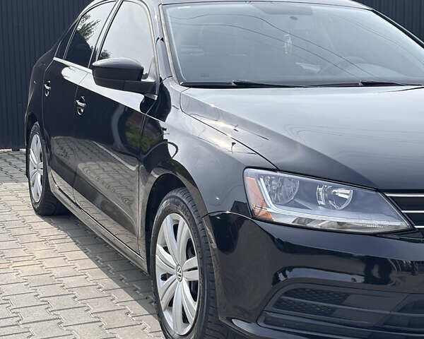 Черный Фольксваген Джетта, объемом двигателя 1.4 л и пробегом 66 тыс. км за 9900 $, фото 12 на Automoto.ua