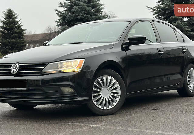 Черный Фольксваген Джетта, объемом двигателя 1.4 л и пробегом 175 тыс. км за 8999 $, фото 1 на Automoto.ua