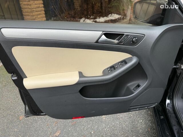 Черный Фольксваген Джетта, объемом двигателя 1.4 л и пробегом 160 тыс. км за 11990 $, фото 10 на Automoto.ua