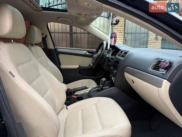 Черный Фольксваген Джетта, объемом двигателя 1.4 л и пробегом 160 тыс. км за 11990 $, фото 21 на Automoto.ua