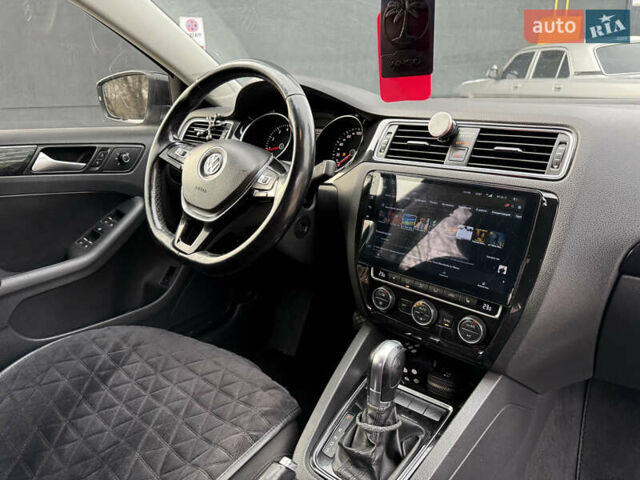 Черный Фольксваген Джетта, объемом двигателя 1.4 л и пробегом 151 тыс. км за 11000 $, фото 39 на Automoto.ua