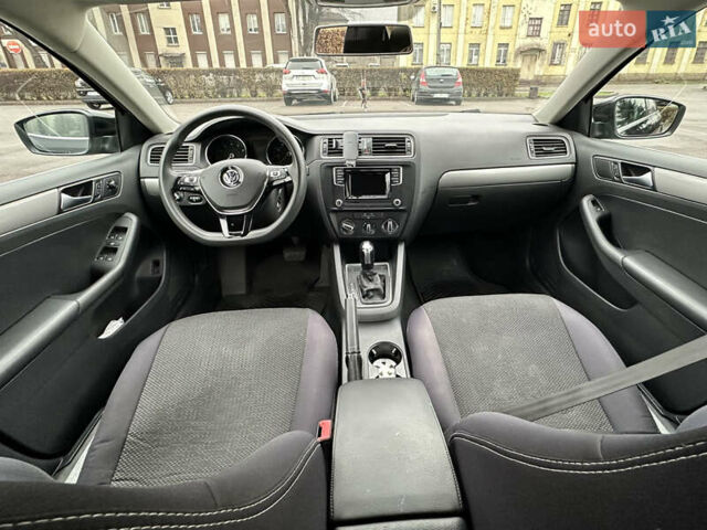 Черный Фольксваген Джетта, объемом двигателя 1.4 л и пробегом 175 тыс. км за 8999 $, фото 24 на Automoto.ua