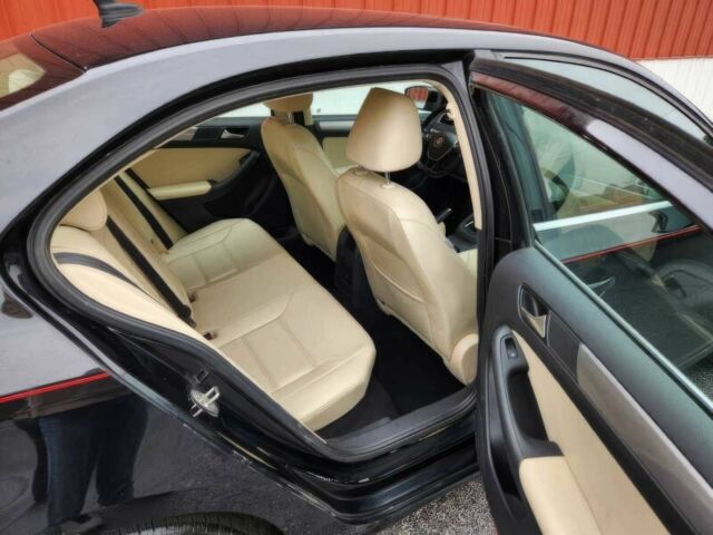 Черный Фольксваген Джетта, объемом двигателя 1.4 л и пробегом 62 тыс. км за 8900 $, фото 10 на Automoto.ua