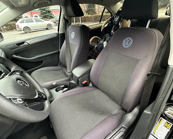 Черный Фольксваген Джетта, объемом двигателя 1.4 л и пробегом 175 тыс. км за 8999 $, фото 20 на Automoto.ua