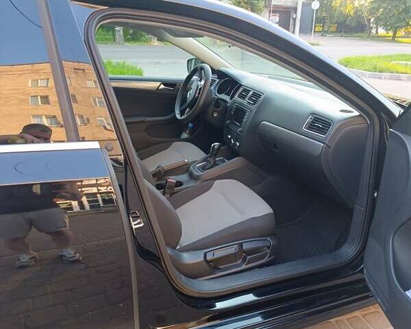 Черный Фольксваген Джетта, объемом двигателя 1.4 л и пробегом 68 тыс. км за 12500 $, фото 9 на Automoto.ua