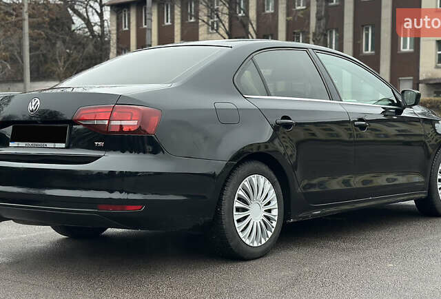 Черный Фольксваген Джетта, объемом двигателя 1.4 л и пробегом 175 тыс. км за 8999 $, фото 8 на Automoto.ua