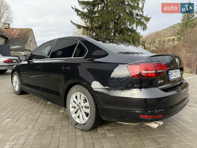 Черный Фольксваген Джетта, объемом двигателя 1.4 л и пробегом 151 тыс. км за 11000 $, фото 18 на Automoto.ua