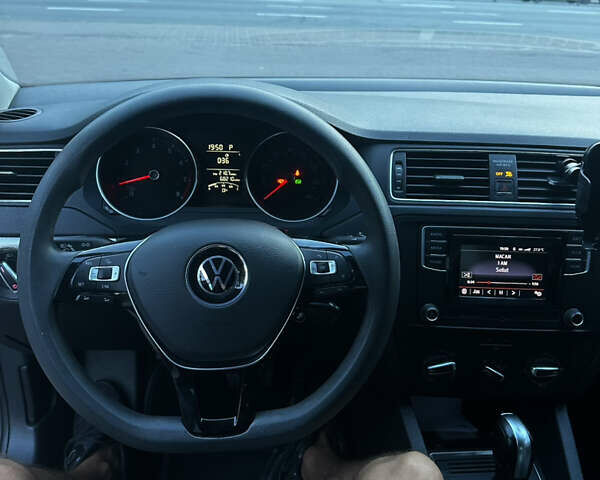 Черный Фольксваген Джетта, объемом двигателя 1.4 л и пробегом 105 тыс. км за 9500 $, фото 6 на Automoto.ua