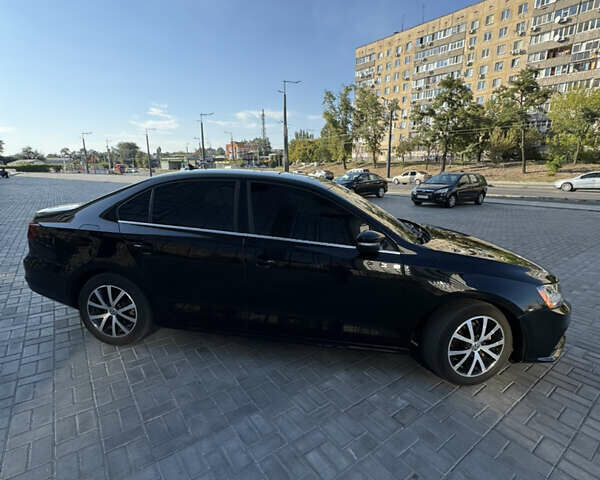 Чорний Фольксваген Джетта, об'ємом двигуна 1.39 л та пробігом 53 тис. км за 12931 $, фото 3 на Automoto.ua