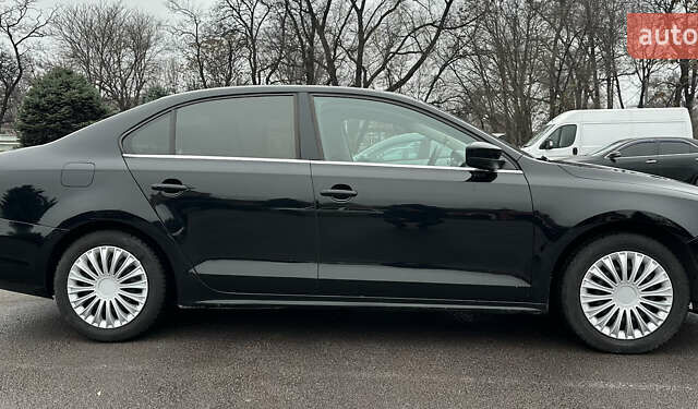 Черный Фольксваген Джетта, объемом двигателя 1.4 л и пробегом 175 тыс. км за 8999 $, фото 7 на Automoto.ua