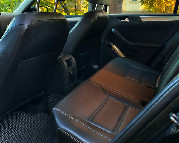 Черный Фольксваген Джетта, объемом двигателя 1.4 л и пробегом 126 тыс. км за 10500 $, фото 7 на Automoto.ua