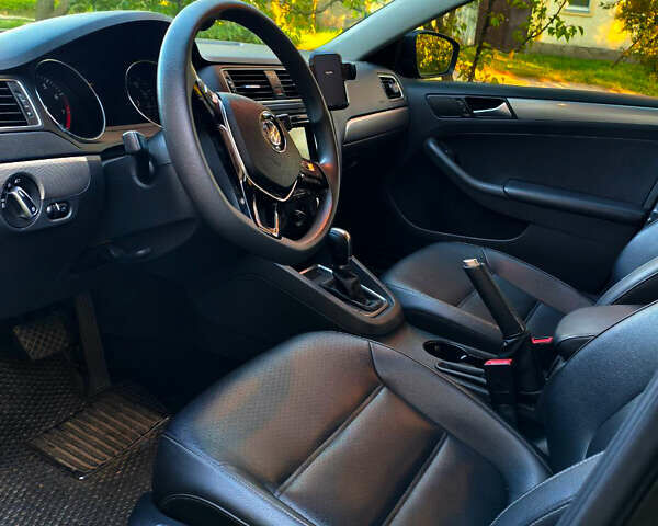 Черный Фольксваген Джетта, объемом двигателя 1.4 л и пробегом 126 тыс. км за 10500 $, фото 4 на Automoto.ua