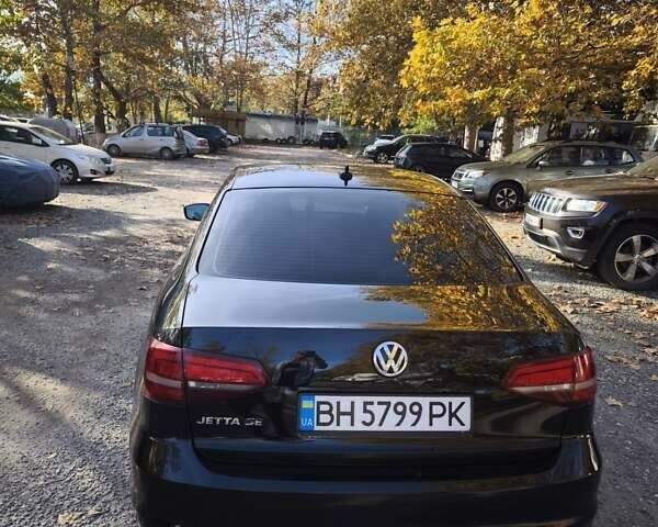 Черный Фольксваген Джетта, объемом двигателя 1.4 л и пробегом 89 тыс. км за 11400 $, фото 4 на Automoto.ua
