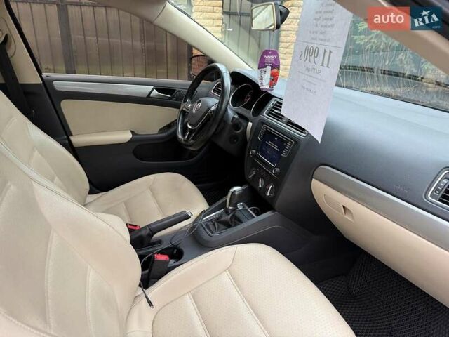 Черный Фольксваген Джетта, объемом двигателя 1.4 л и пробегом 160 тыс. км за 11990 $, фото 20 на Automoto.ua