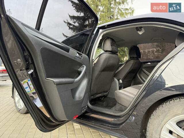 Черный Фольксваген Джетта, объемом двигателя 1.4 л и пробегом 151 тыс. км за 11000 $, фото 41 на Automoto.ua