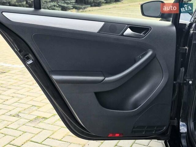 Черный Фольксваген Джетта, объемом двигателя 1.4 л и пробегом 126 тыс. км за 8900 $, фото 23 на Automoto.ua