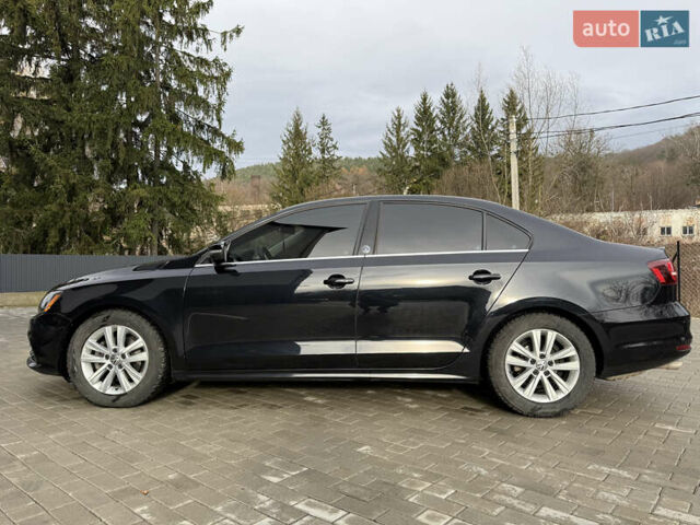 Черный Фольксваген Джетта, объемом двигателя 1.4 л и пробегом 151 тыс. км за 11000 $, фото 13 на Automoto.ua