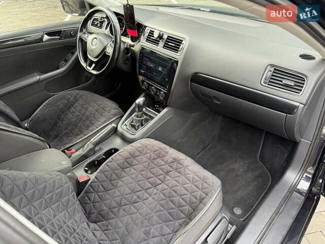 Черный Фольксваген Джетта, объемом двигателя 1.4 л и пробегом 151 тыс. км за 11000 $, фото 30 на Automoto.ua