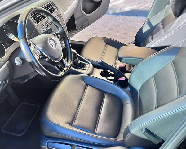 Черный Фольксваген Джетта, объемом двигателя 1.4 л и пробегом 156 тыс. км за 10500 $, фото 8 на Automoto.ua