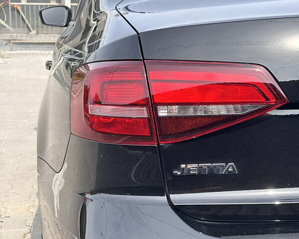 Черный Фольксваген Джетта, объемом двигателя 1.4 л и пробегом 66 тыс. км за 9900 $, фото 8 на Automoto.ua