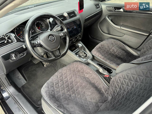 Черный Фольксваген Джетта, объемом двигателя 1.4 л и пробегом 151 тыс. км за 11000 $, фото 26 на Automoto.ua