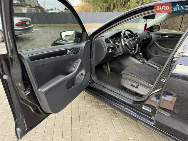 Черный Фольксваген Джетта, объемом двигателя 1.4 л и пробегом 151 тыс. км за 11000 $, фото 25 на Automoto.ua