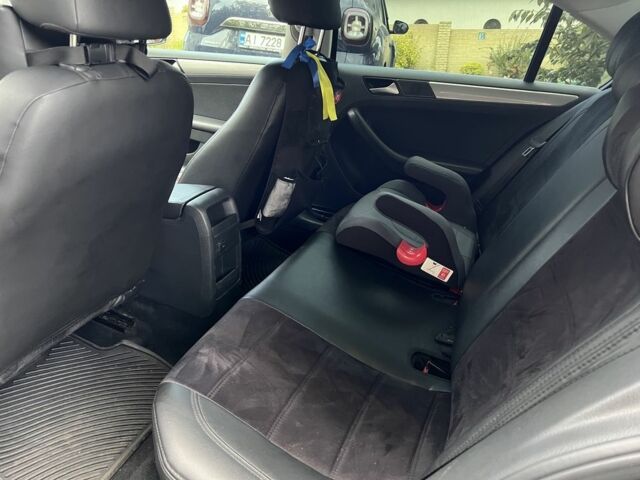 Чорний Фольксваген Джетта, об'ємом двигуна 1.4 л та пробігом 112 тис. км за 10800 $, фото 8 на Automoto.ua