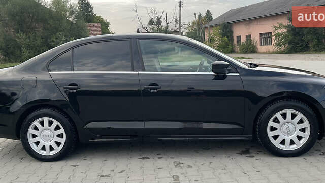 Чорний Фольксваген Джетта, об'ємом двигуна 1.4 л та пробігом 102 тис. км за 9250 $, фото 4 на Automoto.ua