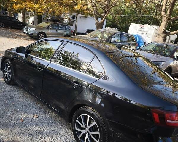 Черный Фольксваген Джетта, объемом двигателя 1.4 л и пробегом 89 тыс. км за 11400 $, фото 9 на Automoto.ua