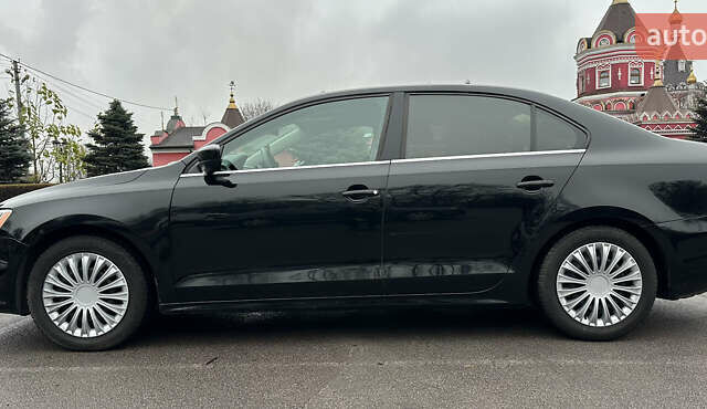 Черный Фольксваген Джетта, объемом двигателя 1.4 л и пробегом 175 тыс. км за 8999 $, фото 11 на Automoto.ua