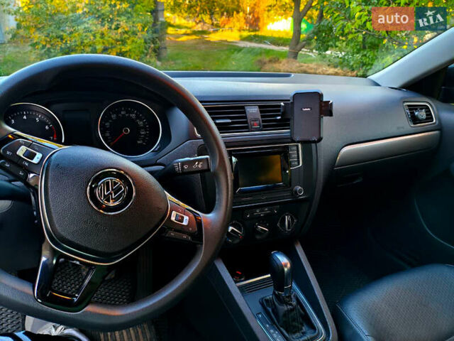 Черный Фольксваген Джетта, объемом двигателя 1.4 л и пробегом 126 тыс. км за 10500 $, фото 5 на Automoto.ua