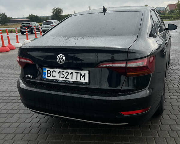 Чорний Фольксваген Джетта, об'ємом двигуна 1.39 л та пробігом 183 тис. км за 12000 $, фото 5 на Automoto.ua