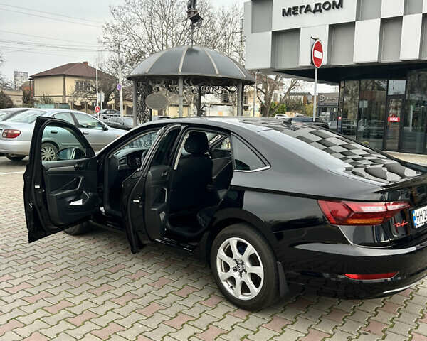 Чорний Фольксваген Джетта, об'ємом двигуна 1.4 л та пробігом 160 тис. км за 14500 $, фото 5 на Automoto.ua