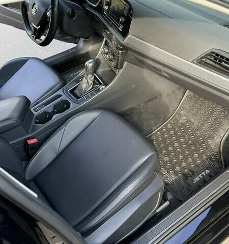 Чорний Фольксваген Джетта, об'ємом двигуна 1.4 л та пробігом 124 тис. км за 15900 $, фото 4 на Automoto.ua