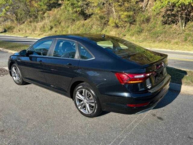 Черный Фольксваген Джетта, объемом двигателя 1.4 л и пробегом 56 тыс. км за 10000 $, фото 4 на Automoto.ua